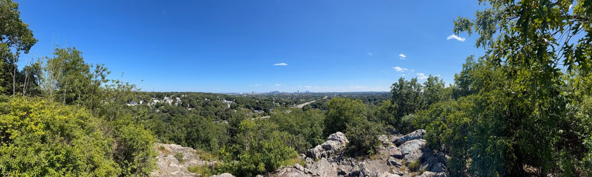 Panorama from the granite ledges of Pine Hill over the Fells woods, Medford